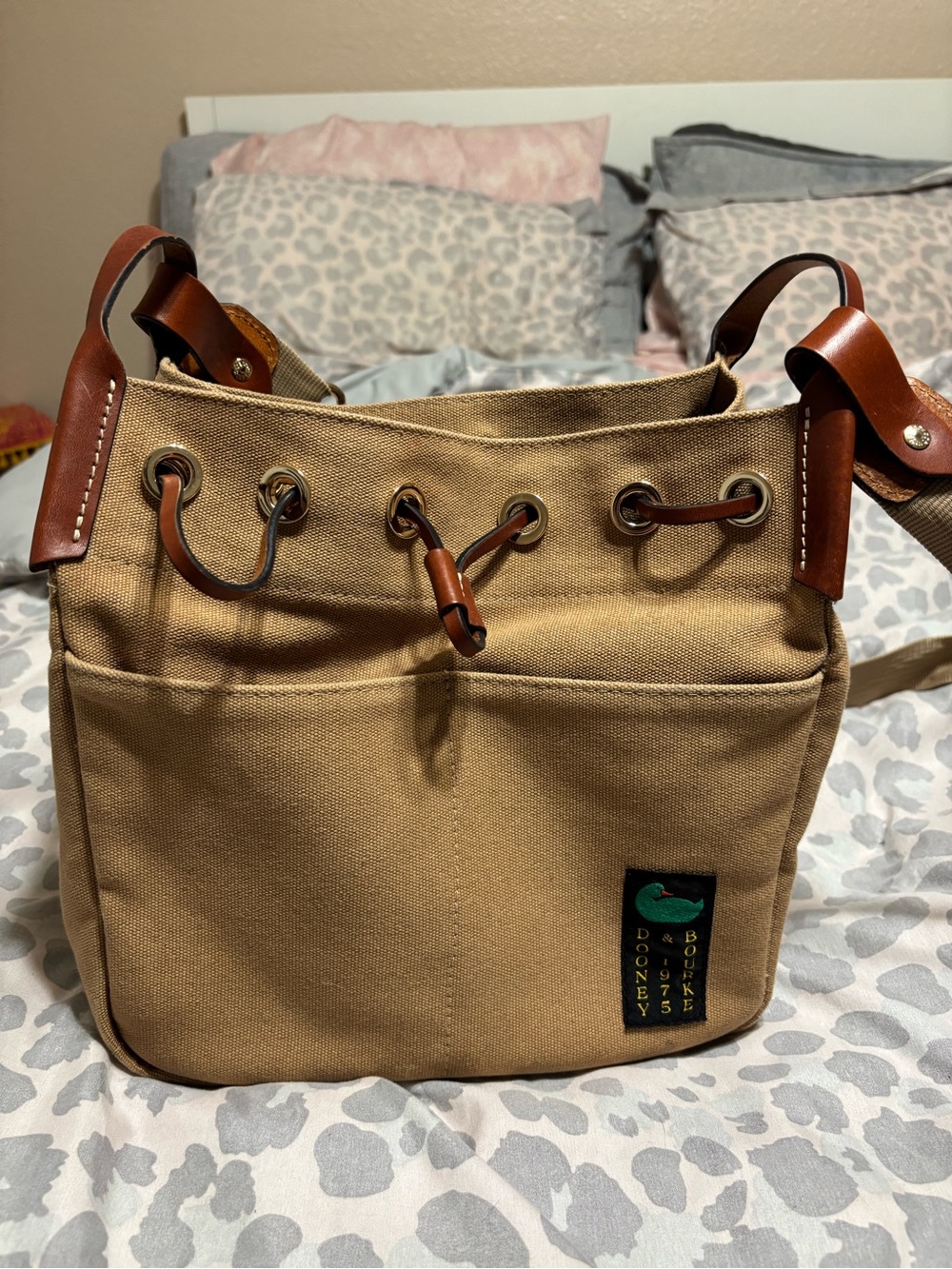 Dooney & Bourke Tan Canvas Messenger Bag with Brown Leather Trim